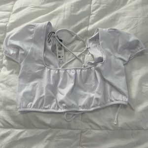 garage NWT cropped white blouse with lace up backing